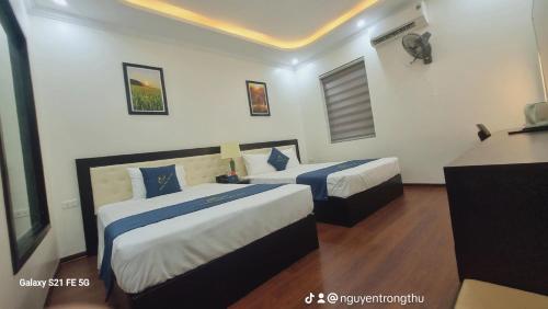 Sao Việt HTH Hotel客房内的一张或多张床位