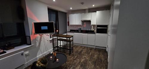 Cosy studio flat in North London的厨房或小厨房
