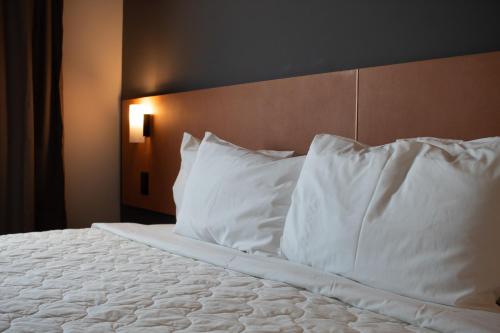 Comfort Hotel Presidente Prudente客房内的一张或多张床位