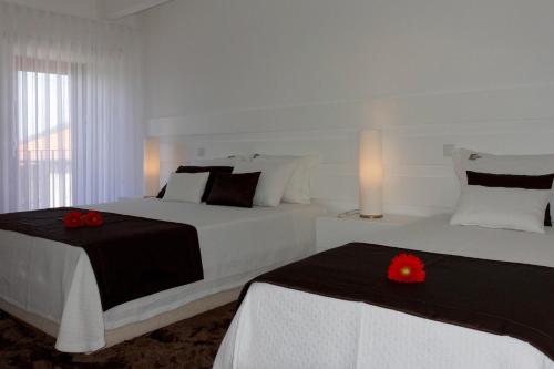 Cantinho do Cantador客房内的一张或多张床位