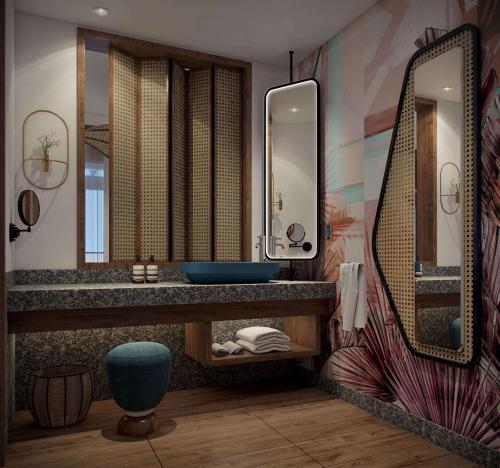 Anse a La MoucheCanopy By Hilton Seychelles Resort的一间带水槽和镜子的浴室