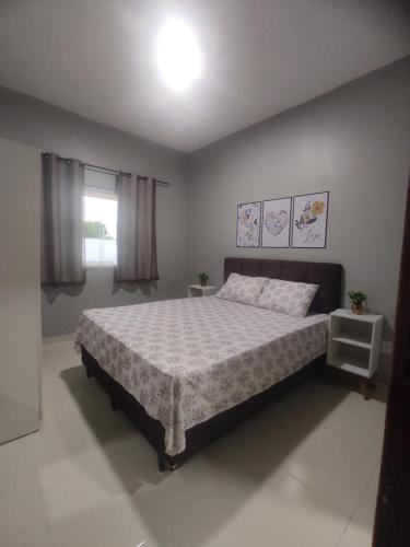 圣阿马鲁Dunas residence casa 15- Lençois Maranhense的一间卧室,卧室内配有一张大床