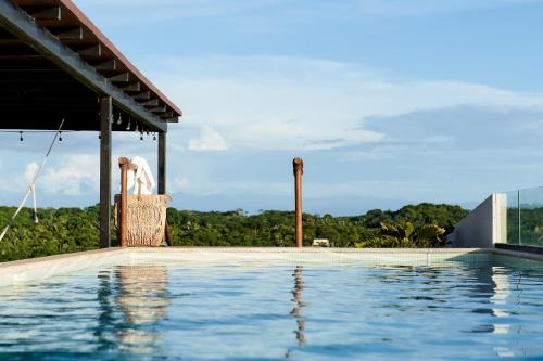 蓬塔米塔Hotel Basalto的美景度假酒店的游泳池