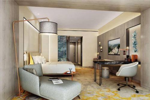 台州台州希尔顿酒店的一间卧室配有一张床、一张桌子和一把椅子