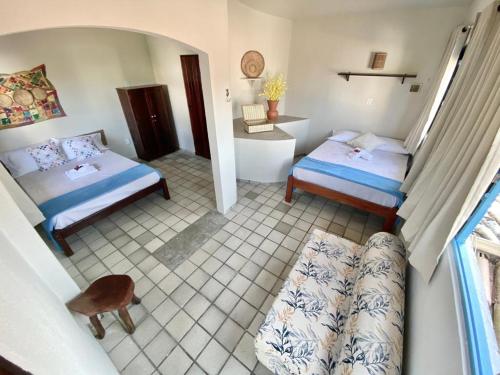 Pousada Praias do Norte客房内的一张或多张床位