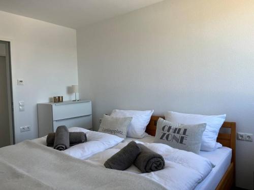 Sonnige Wohnung mit schöner Aussicht in Wolfurt客房内的一张或多张床位