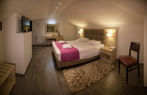 费洛卡利亚酒店客房内的一张或多张床位