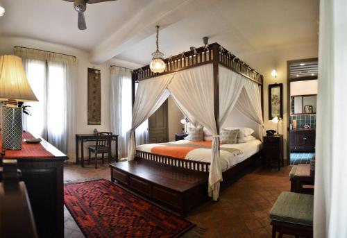 Satri House Hotel客房内的一张或多张床位