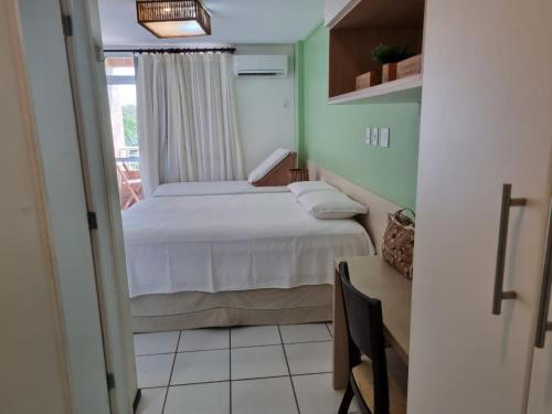 Gran Lençóis Flat Residence客房内的一张或多张床位