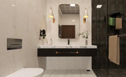 凡城Elite World GO Van Edremit的一间带水槽、卫生间和镜子的浴室