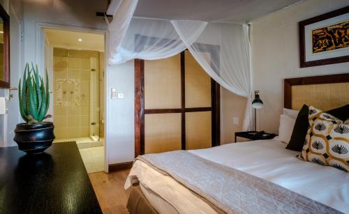 Chobe Marina Lodge客房内的一张或多张床位