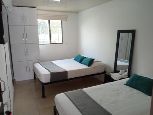 Hotel Casa Guajira Real客房内的一张或多张床位