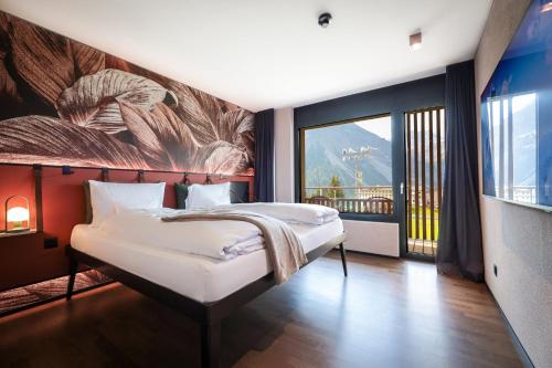 阿罗萨Aves Arosa的一间卧室配有一张壁画床