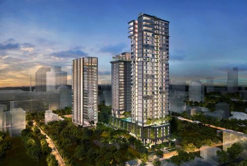 雅加达NEW Charming 2BR Apartment in Central Jakarta的城市中两座高楼 ⁇ 染