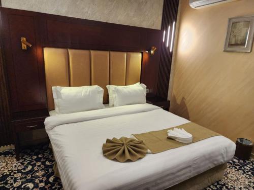 EWG Al Hamra Hotel客房内的一张或多张床位