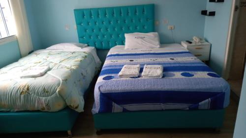 Hospedaje La Ola Azul客房内的一张或多张床位