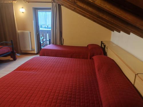 Garnì Bonsai客房内的一张或多张床位