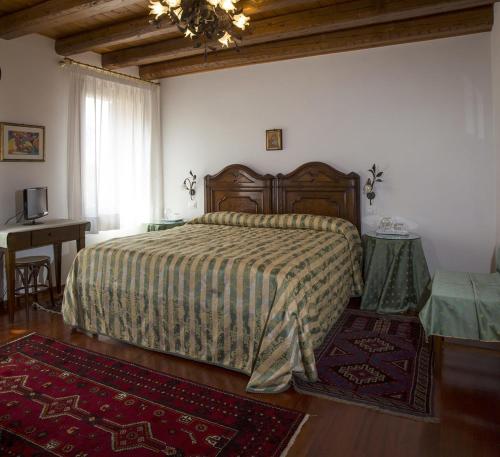 达尼诺提农家乐客房内的一张或多张床位