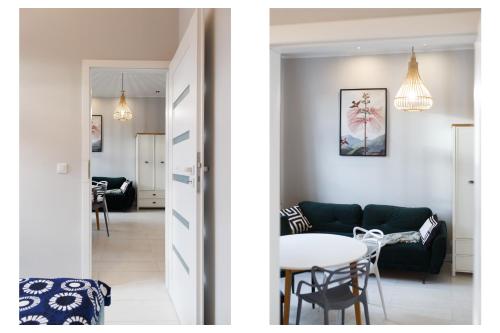 罗兹Apartament Piotrkowska 67 Primo的客厅配有沙发和桌子