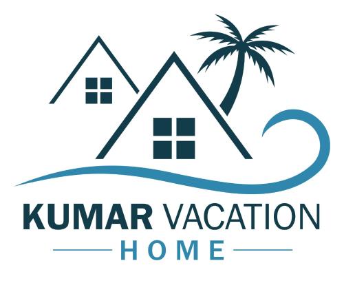 南迪KumarVacation Home 38 Kennedy Road Unit 1的海滩上的房子和棕榈树的标志