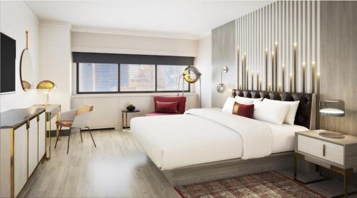 纽约MTS行政酒店的卧室配有一张白色大床和一张书桌