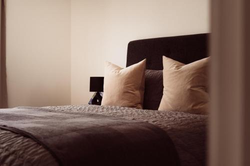 Hemel Apartments- Tranquil Haven客房内的一张或多张床位