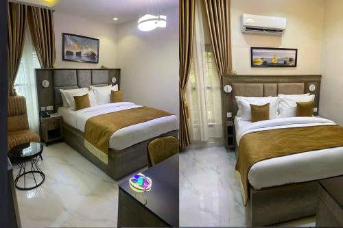 阿布贾Castle Estate Apartments的酒店客房,配有两张床和椅子