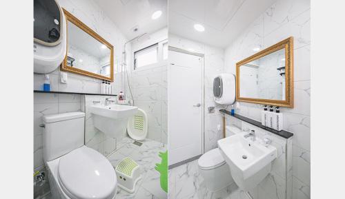 济州市Homechee Kids Poolvilla的白色的浴室设有卫生间和水槽。