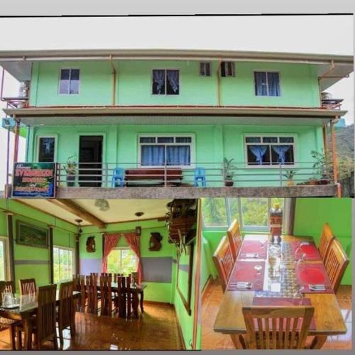 巴纳韦Banaue Evergreen Hostel and Restaurant的绿色房屋,配有桌椅