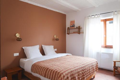Appartement cosy sur la route des vins d'Alsace客房内的一张或多张床位