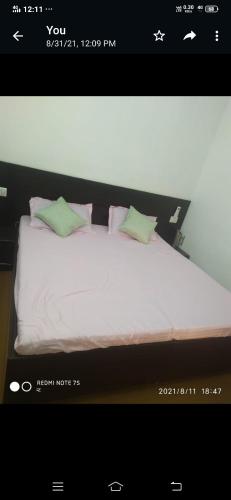 SPOT ON Shree Jee Ghust House客房内的一张或多张床位