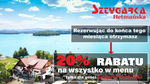 索利纳Sztygarka Hetmańska Resort Solina的湖景度假屋