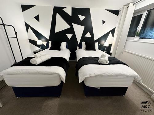 Kettering/Stylish/ Perfect for Contractors客房内的一张或多张床位