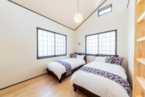 Winds of Senjuku Asakusa / Vacation STAY 46777客房内的一张或多张床位
