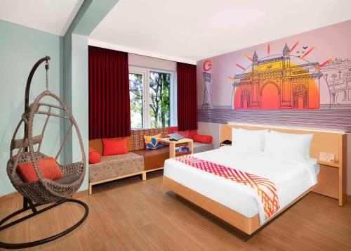 孟买Ginger Mumbai Airport的一间卧室配有一张床和秋千