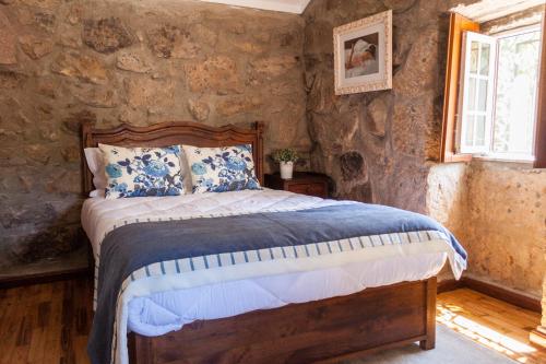 Casa Moinho da Mouta客房内的一张或多张床位