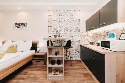 毛科Oliver Apartman的小型公寓 - 带床和厨房
