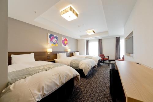 京都Gran M’s 酒店客房内的一张或多张床位