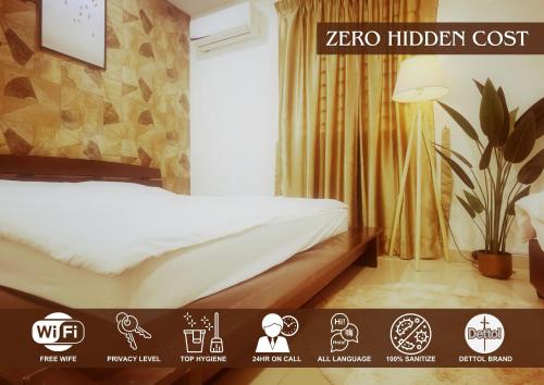 亚依淡2-Bedroom Suite near Kek Lok Si & Penang Hill, Dual key system的卧室配有一张床