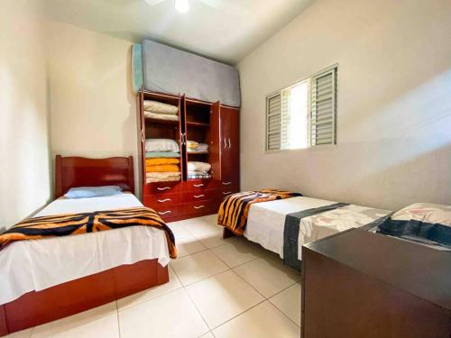 Casa entre Cabo Frio e Arraial do Cabo客房内的一张或多张床位
