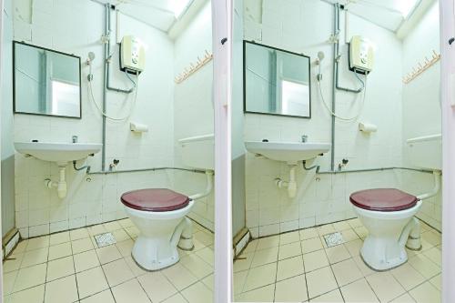 马六甲Grand Heritage Hotel的一间带卫生间和水槽的浴室