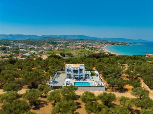 蒂锡利维AJ - Seaview Private Villa的享有海滩房屋的空中景致