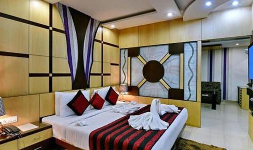 FabHotel Prime Simna International客房内的一张或多张床位