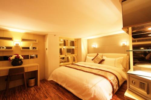 广州城市驿站酒店公寓（保利中达广场分店）客房内的一张或多张床位