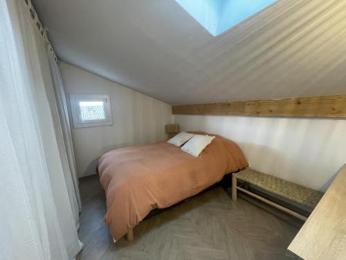 La Petite Alpille - Chez Clara客房内的一张或多张床位
