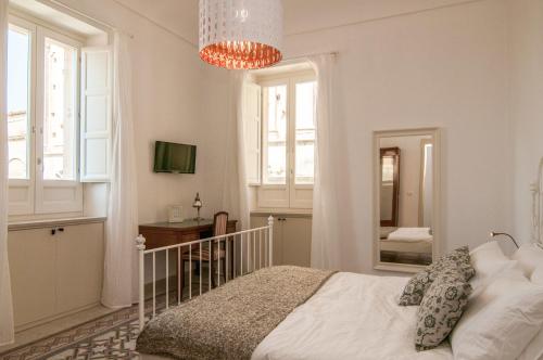 B&B Novecento Siciliano客房内的一张或多张床位