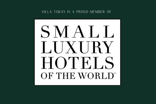 吉利阿尔Villa Tokay - Luxury Private Villas的一本书封面,书封世界小型豪华酒店