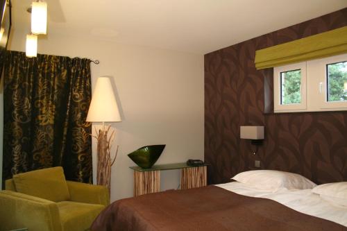 欧莱雅阿美杜贝丹酒店客房内的一张或多张床位