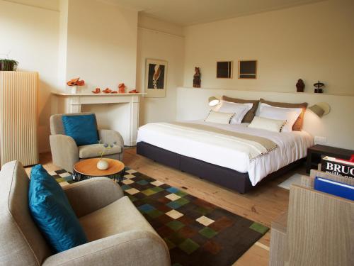 阿尔法比特住宿加早餐旅馆 - 豪华宾馆和艺术画廊客房内的一张或多张床位