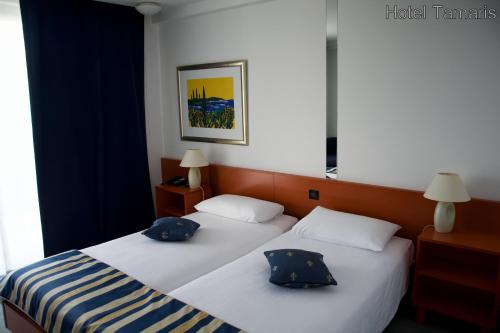 Hotel Tamaris客房内的一张或多张床位